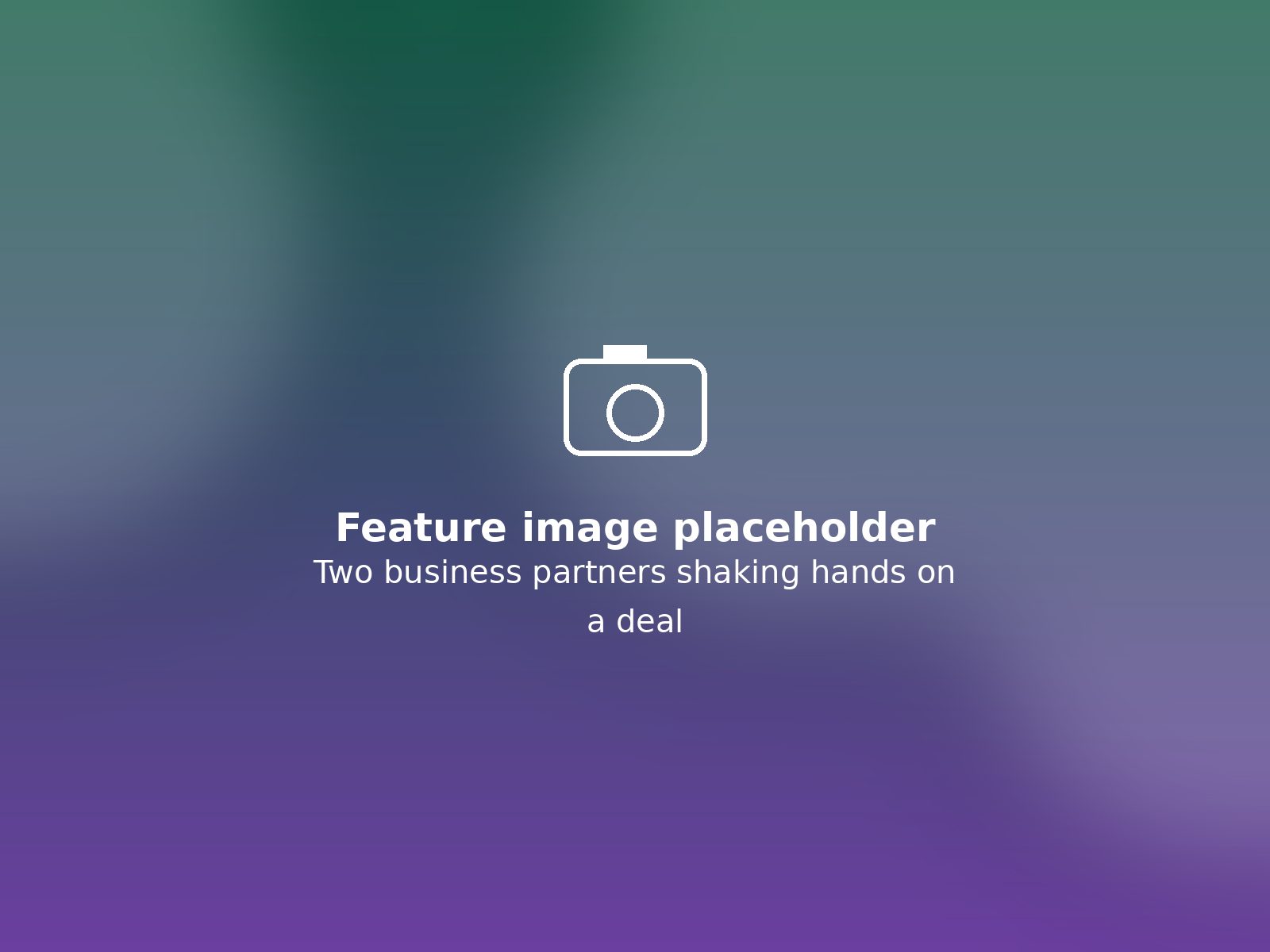 Two business partners shaking hands on a deal